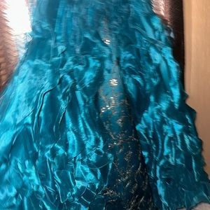 Dress is complete and only worn once.